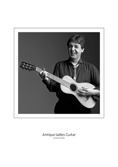 Paul McCartney with an Antique Ladies' Guitar Fine Art Print